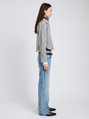 Proenza Schouler Side full length image of model wearing Olive Shirt in Stripe Cotton in Parchment, dark teal