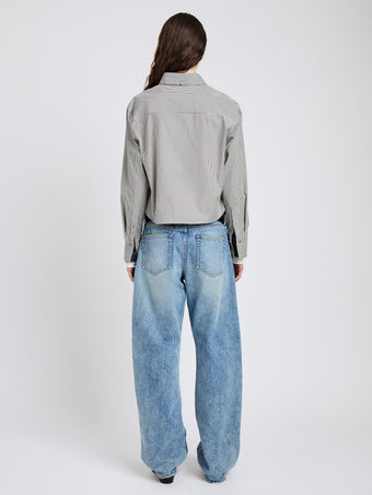 Proenza Schouler Back full length image of model wearing Olive Shirt in Stripe Cotton in Parchment, dark teal