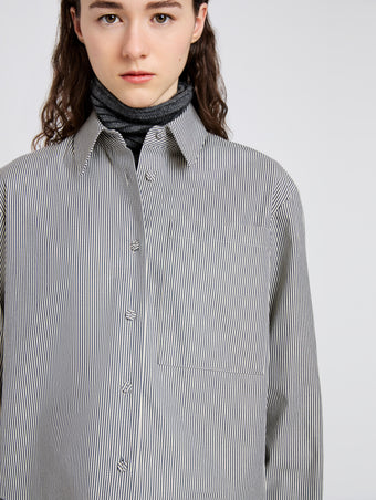 Proenza Schouler Detail image of model wearing Olive Shirt in Stripe Cotton in Parchment, dark teal