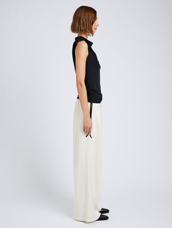 Proenza Schouler Side full length image of model wearing Elna Top in Crepe Jersey in Black