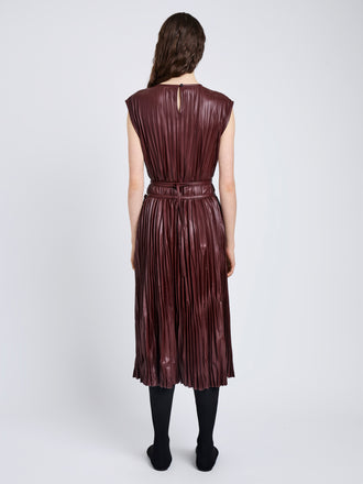 Proenza Schouler Back full length image of model wearing Rosalyn Skirt in Faux Leather in Oxblood