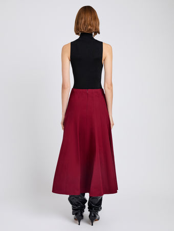 Proenza Schouler Back full length image of model wearing Heidi Skirt in Tech Cotton in Claret