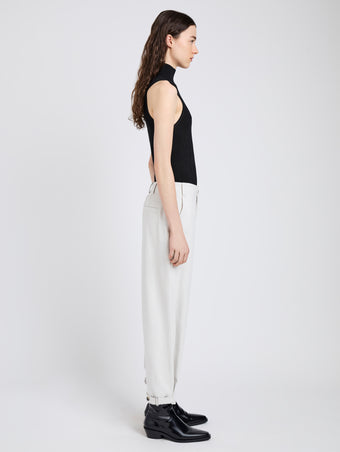 Proenza Schouler Side full length image of model wearing Kay Pant in Wool Garbardine in Bone Melange