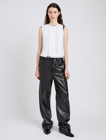 Proenza Schouler Front full length image of model wearing Magnus Pant in Lightweight Leather in Black
