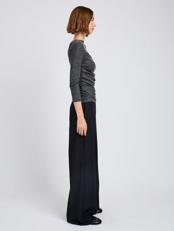 Proenza Schouler Side full length image of model wearing Lydia Pant in Drapey Suiting in Black