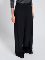 Proenza Schouler Detail image of model wearing Lydia Pant in Drapey Suiting in Black