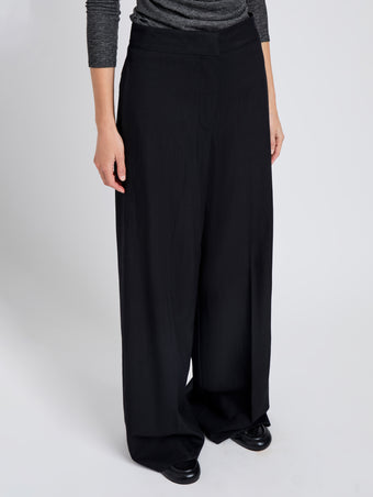 Proenza Schouler Detail image of model wearing Lydia Pant in Drapey Suiting in Black