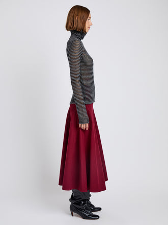 Proenza Schouler Side full length image of model wearing Hailey Sweater in Cashmere Silk Stripe in Grey, black
