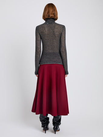 Proenza Schouler Back full length image of model wearing Hailey Sweater in Cashmere Silk Stripe in Grey, black