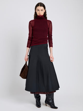 Proenza Schouler Front full length image of model wearing Hailey Sweater in Cashmere Silk Stripe in Claret, black