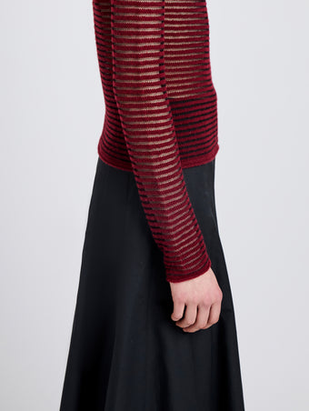 Proenza Schouler Detail image of model wearing Hailey Sweater in Cashmere Silk Stripe in Claret, black