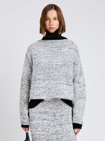 Proenza Schouler Cropped front image of model wearing Maddox Sweater in Marled Cotton in Bone, black melange