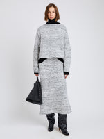 Proenza Schouler Front full length image of model wearing Maddox Sweater in Marled Cotton in Bone, black melange