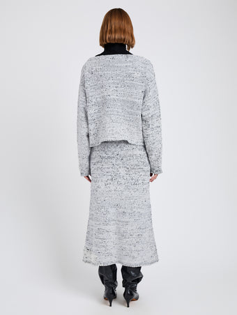 Proenza Schouler Back full length image of model wearing Maddox Sweater in Marled Cotton in Bone, black melange