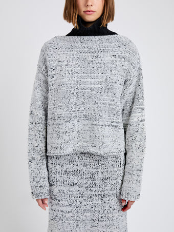 Proenza Schouler Detail image of model wearing Maddox Sweater in Marled Cotton in Bone, black melange