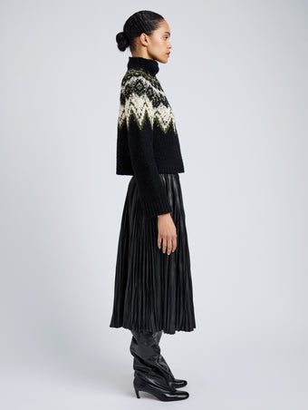 Proenza Schouler Side full length image of model wearing Lizzy Sweater in Textured Fairisle in Black Multi