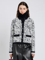 Proenza Schouler cropped image of model wearing Amina Jacket in Jacquard Alpaca in Black, white zebra