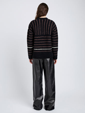 Proenza Schouler Back full length image of model wearing Leonie Sweater in Stripe Wool in Black Multi