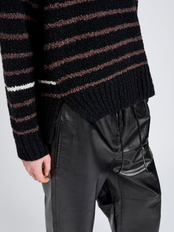 Proenza Schouler Detail image of model wearing Leonie Sweater in Stripe Wool in Black Multi