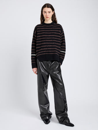 Proenza Schouler Front full length image of model wearing Leonie Sweater in Stripe Wool in Black Multi