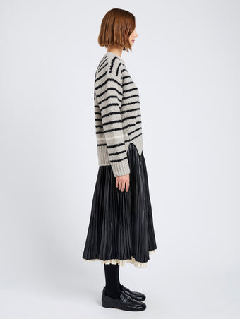 Proenza Schouler Side full length image of model wearing Leonie Sweater in Stripe Wool in Dark Grey Multi
