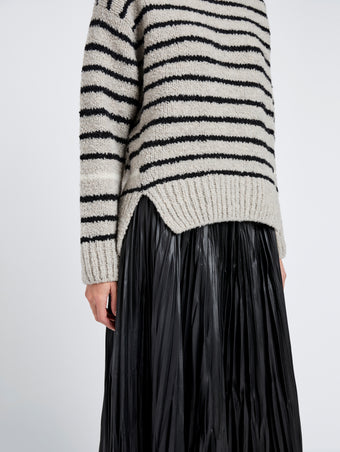 Proenza Schouler Detail image of model wearing Leonie Sweater in Stripe Wool in Dark Grey Multi