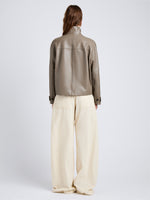 Proenza Schouler Back full length image of model wearing Gio Jacket in Lightweight Leather in Fawn