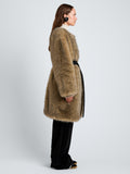 Proenza Schouler Side full length image of model wearing Khai Coat in Faux Fur in Natural