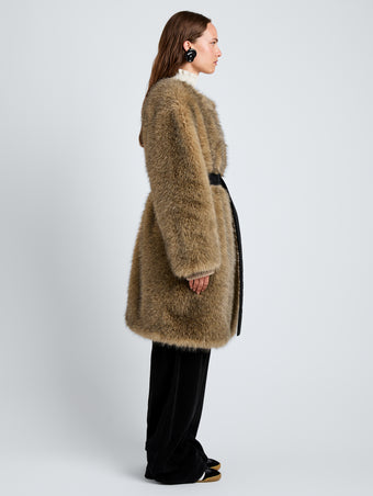 Proenza Schouler Side full length image of model wearing Khai Coat in Faux Fur in Natural