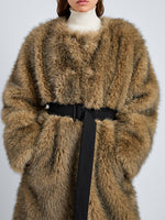 Proenza Schouler Detail image of model wearing Khai Coat in Faux Fur in Natural
