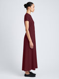 Proenza Schouler Side full length image of model wearing Noelle Dress in Eco Jersey in Wine