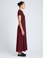 Proenza Schouler Side full length image of model wearing Noelle Dress in Eco Jersey in Wine