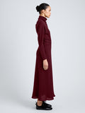 Proenza Schouler Side full length image of model wearing Soren Dress in Rib Crepe in Wine