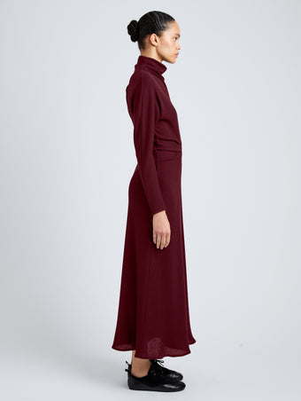 Proenza Schouler Side full length image of model wearing Soren Dress in Rib Crepe in Wine