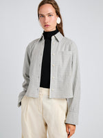 Proenza Schouler Detail image of model wearing Olive Shirt in Check Shirting in Grey Multi