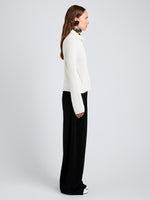 Proenza Schouler Side full length image of model wearing Aria Pant in Corduroy in Black