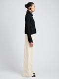 Proenza Schouler Side full length image of model wearing Aria Pant in Corduroy in Off White