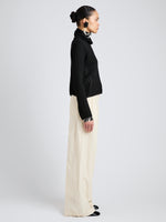 Proenza Schouler Side full length image of model wearing Aria Pant in Corduroy in Off White