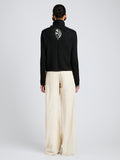 Proenza Schouler Back full length image of model wearing Aria Pant in Corduroy in Off White