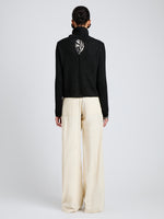 Proenza Schouler Back full length image of model wearing Aria Pant in Corduroy in Off White