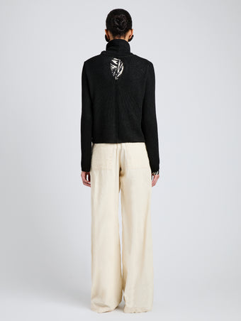 Proenza Schouler Back full length image of model wearing Aria Pant in Corduroy in Off White