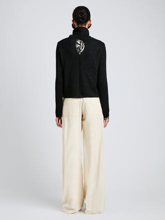 Proenza Schouler Back full length image of model wearing Aria Pant in Corduroy in Off White