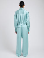 Proenza Schouler Back full length image of model wearing Magnus Pant in Crinkled Crepe in Sea Glass