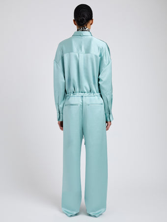 Proenza Schouler Back full length image of model wearing Magnus Pant in Crinkled Crepe in Sea Glass