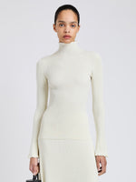 Proenza Schouler Front cropped image of model wearing Phyllis Turtleneck in Geo Knits in Off White