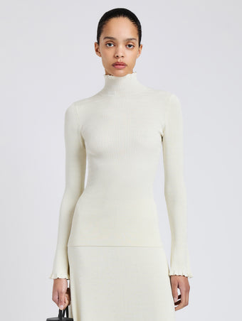Proenza Schouler Front cropped image of model wearing Phyllis Turtleneck in Geo Knits in Off White