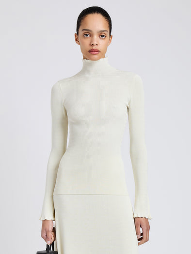 Proenza Schouler Front cropped image of model wearing Phyllis Turtleneck in Geo Knits in Off White