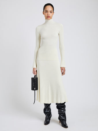 Proenza Schouler Front full length image of model wearing Phyllis Turtleneck in Geo Knits in Off White