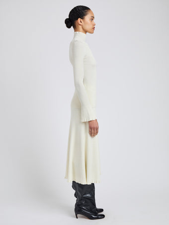 Proenza Schouler Side full length image of model wearing Phyllis Turtleneck in Geo Knits in Off White
