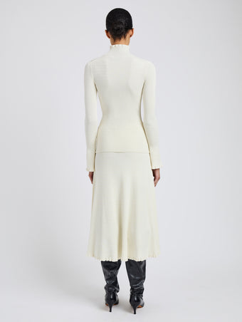 Proenza Schouler Back full length image of model wearing Phyllis Turtleneck in Geo Knits in Off White